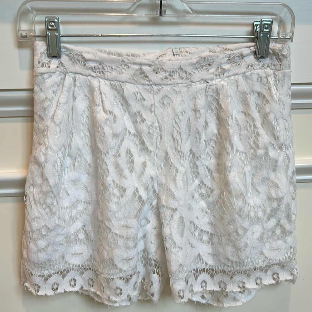 Lace all over pleated white shorts size S
